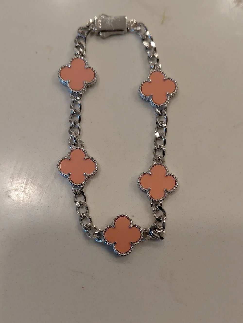 BCBGMaxAzria STERLING SILVER Bracelet with Pink Clover Motifs